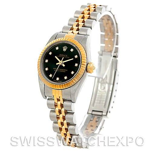 This Oyster Perpetual Rolex watch is shown at a 3/4 angle, displaying the face, bezel, crown, and two-tone bracelet.