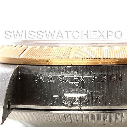 The image shows a close-up of the case side of a Rolex Oyster Perpetual 76243 Women's Steel and Gold (two tone) Silver Dial 76243 Women's Steel and Gold (two tone) Silver Dial, highlighting the model and serial numbers under the bezel.