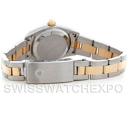 This image shows the back view of a Rolex Oyster Perpetual 76243 Women's Steel and Gold (two tone) Silver Dial 76243 Women's Steel and Gold (two tone) Silver Dial watch, highlighting its bi-color bracelet and clasp.