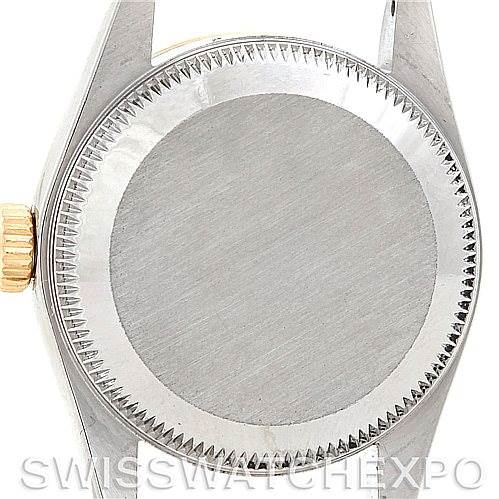 This image shows the back case and crown of the Rolex Oyster Perpetual 76243 Women's Steel and Gold (two tone) Silver Dial 76243 Women's Steel and Gold (two tone) Silver Dial watch, viewed from a rear angle.