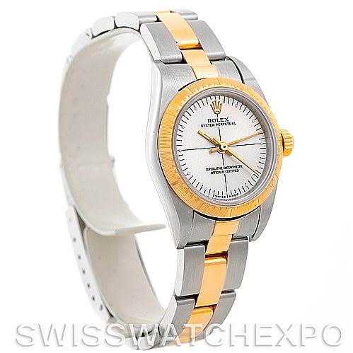 The image shows a Rolex Oyster Perpetual 76243 Women's Steel and Gold (two tone) Silver Dial 76243 Women's Steel and Gold (two tone) Silver Dial watch at an angled view with a two-tone stainless steel and gold bracelet and a white dial.