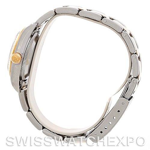 The image shows a side view of a Rolex Oyster Perpetual 76243 Women's Steel and Gold (two tone) Silver Dial 76243 Women's Steel and Gold (two tone) Silver Dial watch, highlighting the bracelet and case with the crown visible.