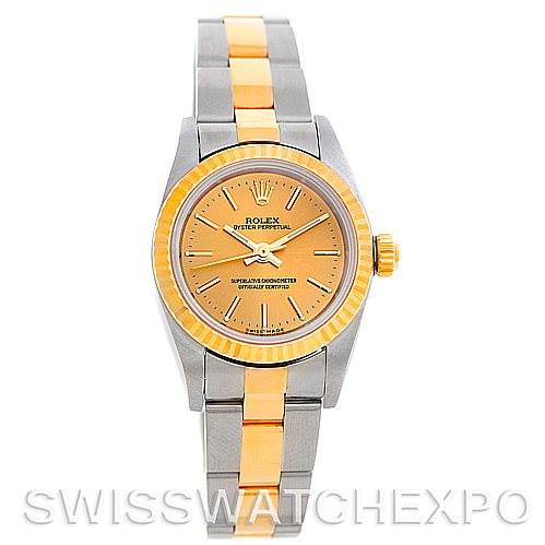 This image shows a front view of a Rolex Oyster Perpetual 76193 Women's Steel and Gold (two tone) Champagne Dial 76193 Women's Steel and Gold (two tone) Champagne Dial watch, highlighting its two-tone bracelet and gold bezel.
