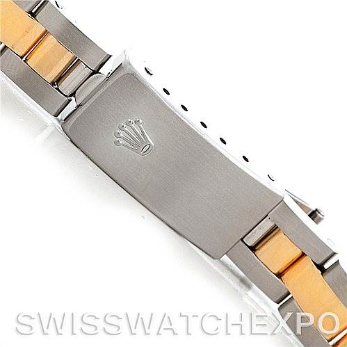 The image shows a close-up of the clasp and part of the bracelet of a Rolex Oyster Perpetual 76193 Women's Steel and Gold (two tone) Champagne Dial 76193 Women's Steel and Gold (two tone) Champagne Dial watch.