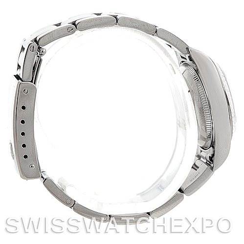 This image shows the side view of a Rolex Oyster Perpetual 76094 Women's Stainless Steel White Dial 76094 Women's Stainless Steel White Dial watch, highlighting the case and bracelet.