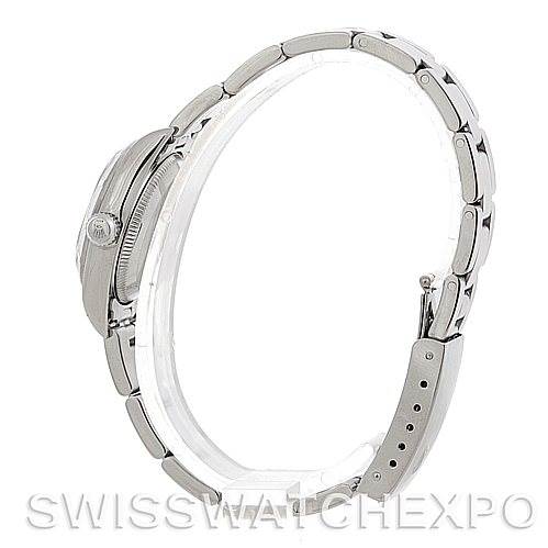 The image shows a side view of a Rolex Oyster Perpetual 76030 Women's Stainless Steel Blue Dial 76030 Women's Stainless Steel Blue Dial watch showcasing the bracelet, case, and crown.