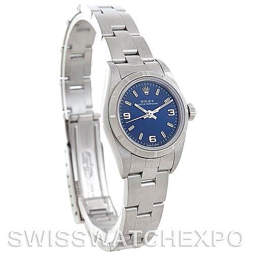 This image shows a side angle of the Rolex Oyster Perpetual 76030 Women's Stainless Steel Blue Dial 76030 Women's Stainless Steel Blue Dial watch, highlighting its blue dial and stainless steel bracelet.