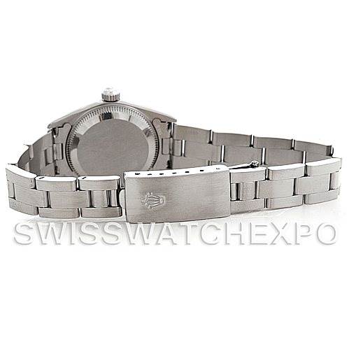 The image shows the back view of a Rolex Oyster Perpetual 76030 Women's Stainless Steel Blue Dial 76030 Women's Stainless Steel Blue Dial watch, highlighting its case back and metal bracelet with the clasp visible.