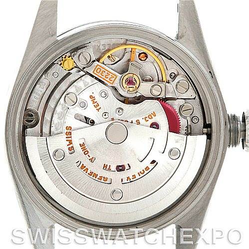 The image shows the back of a Rolex Oyster Perpetual 76030 Women's Stainless Steel White Dial 76030 Women's Stainless Steel White Dial watch, specifically featuring its internal mechanical movement.