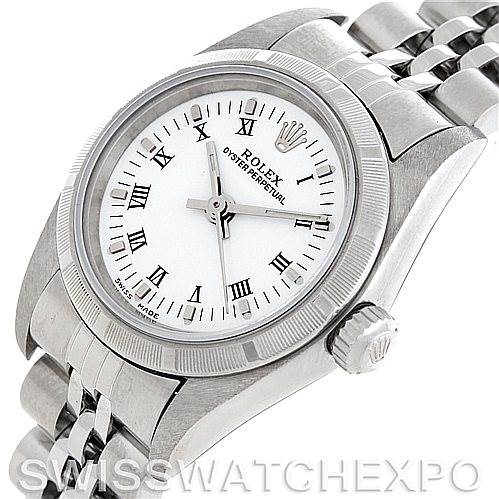 The Rolex Oyster Perpetual 76030 Women's Stainless Steel White Dial 76030 Women's Stainless Steel White Dial watch is shown at an angle highlighting the dial, bezel, and partial bracelet.