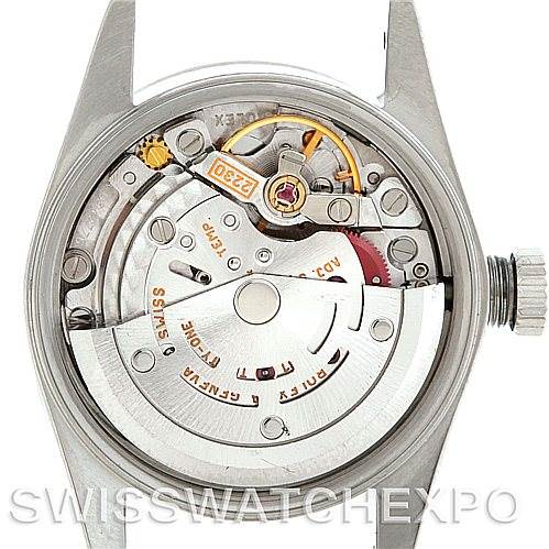The image shows the internal mechanism and movement of a Rolex Oyster Perpetual 76080 Women's Stainless Steel White Dial 76080 Women's Stainless Steel White Dial watch, viewed with the case back removed.