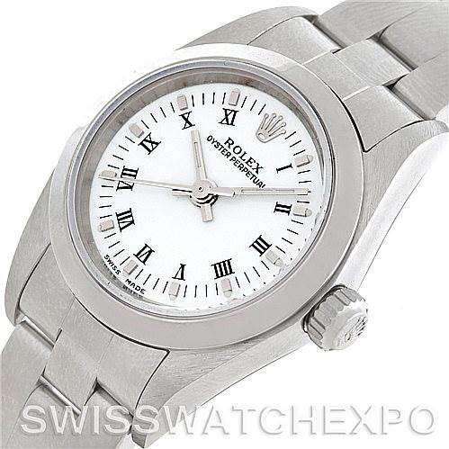 The image shows a close-up, angled view of the face, bezel, crown, and part of the bracelet of a Rolex Oyster Perpetual 76080 Women's Stainless Steel White Dial 76080 Women's Stainless Steel White Dial watch.