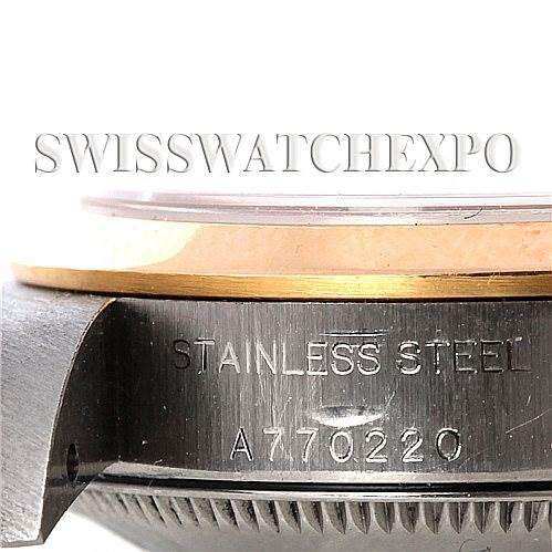 The image shows a close-up of the side of a Rolex Oyster Perpetual 76183 Women's Steel and Gold (two tone) Grey Dial 76183 Women's Steel and Gold (two tone) Grey Dial watch, highlighting the stainless steel casing and serial number "A770220."