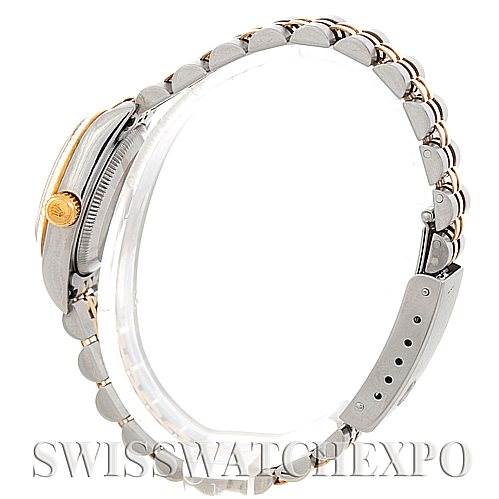 This image shows a side view of the Rolex Oyster Perpetual 76193 Women's Steel and Gold (two tone) Black Dial 76193 Women's Steel and Gold (two tone) Black Dial watch, focusing on the band and the crown.