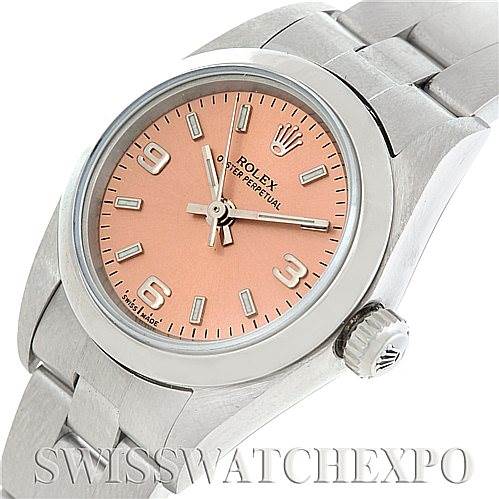This image shows a top-left angled view of the Rolex Oyster Perpetual 76080 Women's Stainless Steel Pink Dial 76080 Women's Stainless Steel Pink Dial watch, highlighting the dial, crown, and bracelet.