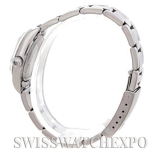 This image shows a side profile view of a Rolex Oyster Perpetual 76080 Women's Stainless Steel Pink Dial 76080 Women's Stainless Steel Pink Dial watch, highlighting its bracelet and case.