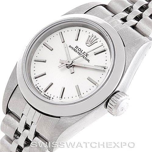 The image shows a close-up angle of the Rolex Oyster Perpetual 67180 Women's Stainless Steel Silver Dial 67180 Women's Stainless Steel Silver Dial watch, highlighting the dial, crown, and part of the bracelet.