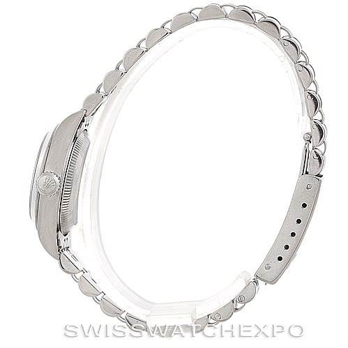 The image shows a side profile of a Rolex Oyster Perpetual 67180 Women's Stainless Steel Silver Dial 67180 Women's Stainless Steel Silver Dial watch, highlighting its bracelet and case thickness.