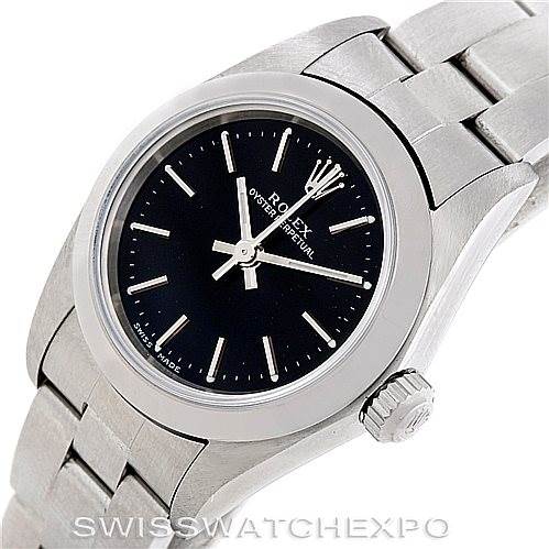 The Rolex Oyster Perpetual 76080 Women's Stainless Steel Black Dial 76080 Women's Stainless Steel Black Dial watch is shown from a top angle, displaying the dial, bezel, crown, and part of the bracelet.