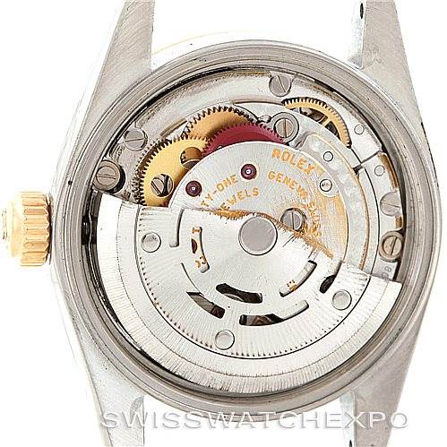 The image shows the internal mechanical movement of a Rolex Oyster Perpetual 76193 Women's Steel and Gold (two tone) Silver Dial 76193 Women's Steel and Gold (two tone) Silver Dial watch viewed from the back.