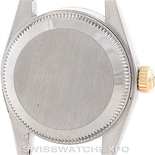 This image shows the case back and crown of a Rolex Oyster Perpetual 76193 Women's Steel and Gold (two tone) Silver Dial 76193 Women's Steel and Gold (two tone) Silver Dial watch.