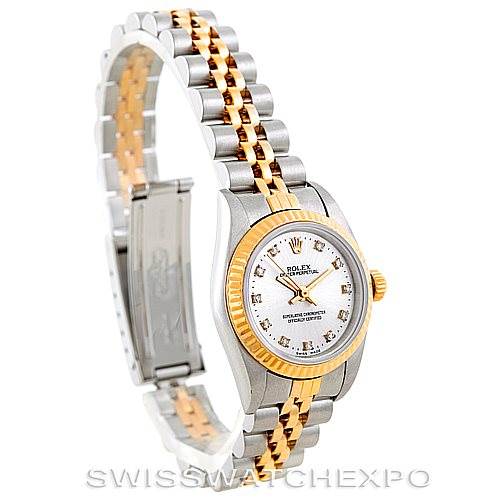 The image shows a Rolex Oyster Perpetual 76193 Women's Steel and Gold (two tone) Silver Dial 76193 Women's Steel and Gold (two tone) Silver Dial watch angled to display the face, bezel, and partially extended bracelet.