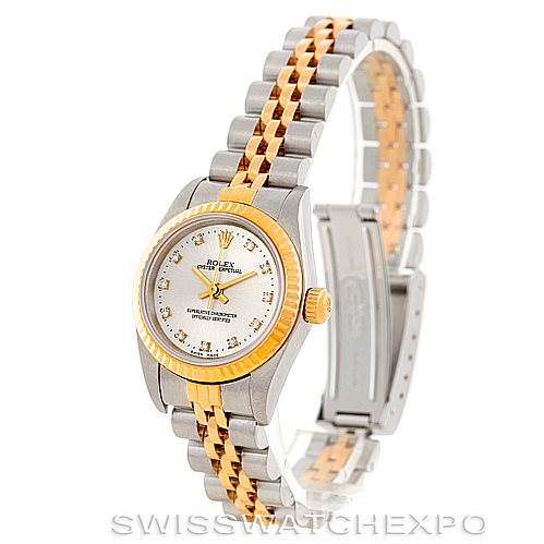 The Rolex Oyster Perpetual 76193 Women's Steel and Gold (two tone) Silver Dial 76193 Women's Steel and Gold (two tone) Silver Dial watch is shown at a 3/4 angle, displaying the dial, bezel, bracelet, and clasp.