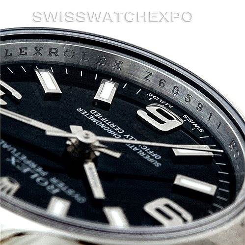This image shows a close-up of the dial and part of the bezel of a Rolex Oyster Perpetual 176200 Women's Stainless Steel Black Dial 176200 Women's Stainless Steel Black Dial watch.