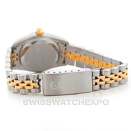 The image shows the clasp and bracelet of a Rolex Oyster Perpetual 76193 Women's Steel and Gold (two tone) Champagne Dial 76193 Women's Steel and Gold (two tone) Champagne Dial watch, viewed from the back.