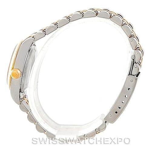 This image shows a side view of a Rolex Oyster Perpetual 76193 Women's Steel and Gold (two tone) Champagne Dial 76193 Women's Steel and Gold (two tone) Champagne Dial watch, highlighting its bracelet and watch case.