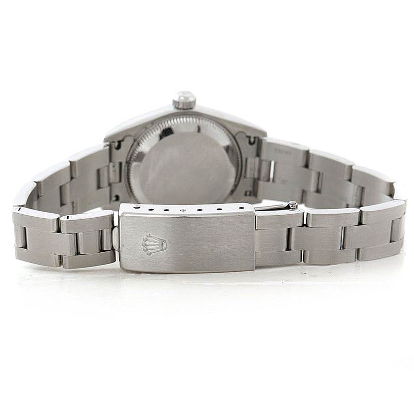 The image shows the back side of a Rolex Oyster Perpetual 76030 Women's Stainless Steel Black Dial 76030 Women's Stainless Steel Black Dial watch, highlighting the clasp and bracelet.