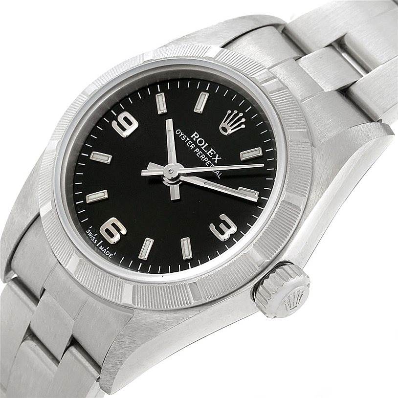 The image shows a close-up angle of the Rolex Oyster Perpetual 76030 Women's Stainless Steel Black Dial 76030 Women's Stainless Steel Black Dial watch, highlighting the bezel, dial, case, and part of the bracelet.