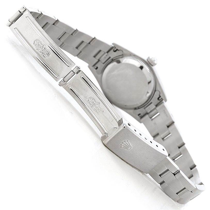 This image shows the back and clasp of a Rolex Oyster Perpetual 76030 Women's Stainless Steel Black Dial 76030 Women's Stainless Steel Black Dial watch, highlighting the bracelet and clasp details.