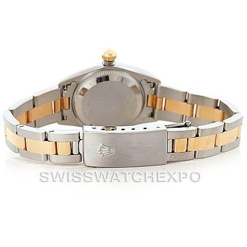 The image shows the back view of a Rolex Oyster Perpetual 76193 Women's Steel and Gold (two tone) Silver Dial 76193 Women's Steel and Gold (two tone) Silver Dial watch, highlighting its clasp and two-tone bracelet.
