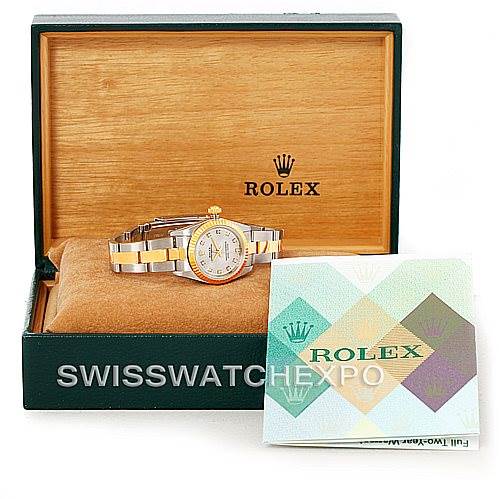 The image shows a Rolex Oyster Perpetual 76193 Women's Steel and Gold (two tone) Silver Dial 76193 Women's Steel and Gold (two tone) Silver Dial watch in its open box, along with accompanying paperwork, viewed from the front.