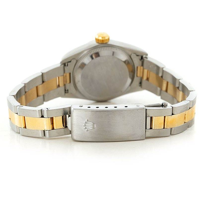 The image shows the back view of a Rolex Oyster Perpetual 67193 Women's Steel and Gold (two tone) Black Dial 67193 Women's Steel and Gold (two tone) Black Dial watch, highlighting the bracelet and clasp.