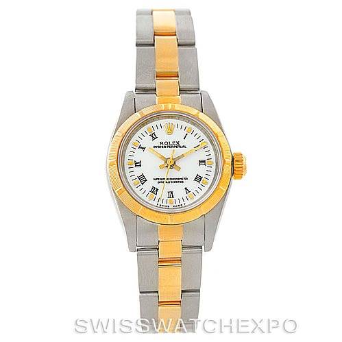 This is a top-view image of a Rolex Oyster Perpetual 67233 Women's Steel and Gold (two tone) White Dial 67233 Women's Steel and Gold (two tone) White Dial watch showing its face, bezel, and two-tone bracelet.