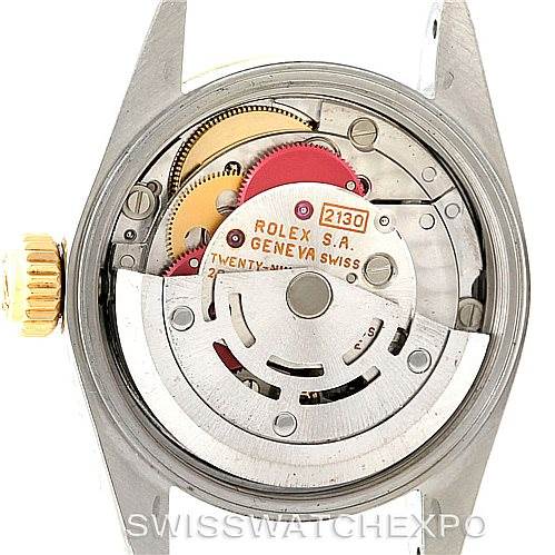 This image shows the internal mechanism (movement) of a Rolex Oyster Perpetual 67233 Women's Steel and Gold (two tone) White Dial 67233 Women's Steel and Gold (two tone) White Dial watch viewed from the back.