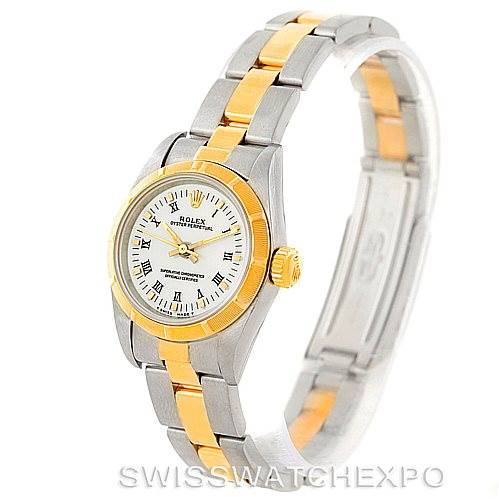 This image shows a Rolex Oyster Perpetual 67233 Women's Steel and Gold (two tone) White Dial 67233 Women's Steel and Gold (two tone) White Dial wristwatch, angled to display the face, bezel, and bracelet.
