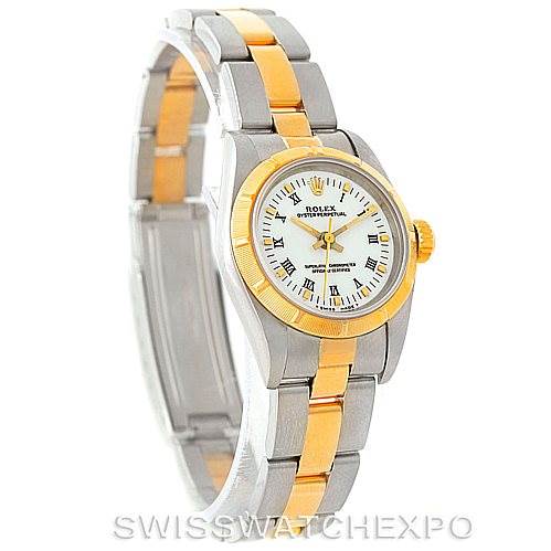 The image shows a side angle of a Rolex Oyster Perpetual 67233 Women's Steel and Gold (two tone) White Dial 67233 Women's Steel and Gold (two tone) White Dial watch, highlighting its two-tone metal bracelet and white dial.