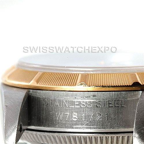 The image shows a close-up side view of the case and bezel of a Rolex Oyster Perpetual 67233 Women's Steel and Gold (two tone) White Dial 67233 Women's Steel and Gold (two tone) White Dial watch, highlighting the stainless steel engravings.