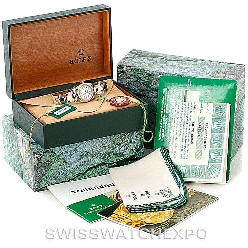 The image shows a Rolex Oyster Perpetual 67233 Women's Steel and Gold (two tone) White Dial 67233 Women's Steel and Gold (two tone) White Dial watch with its box, papers, tags, and accessories from a front angle.
