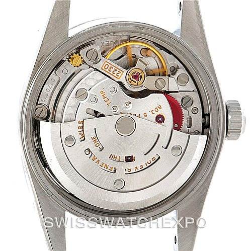 This image shows the movement and inner mechanism of a Rolex Oyster Perpetual 76030 Women's Stainless Steel Silver Dial 76030 Women's Stainless Steel Silver Dial model from a back angle.