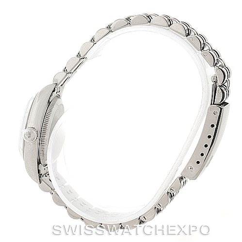 The image shows the side profile of a Rolex Oyster Perpetual 76030 Women's Stainless Steel Silver Dial 76030 Women's Stainless Steel Silver Dial watch, highlighting the bezel, crown, and bracelet.