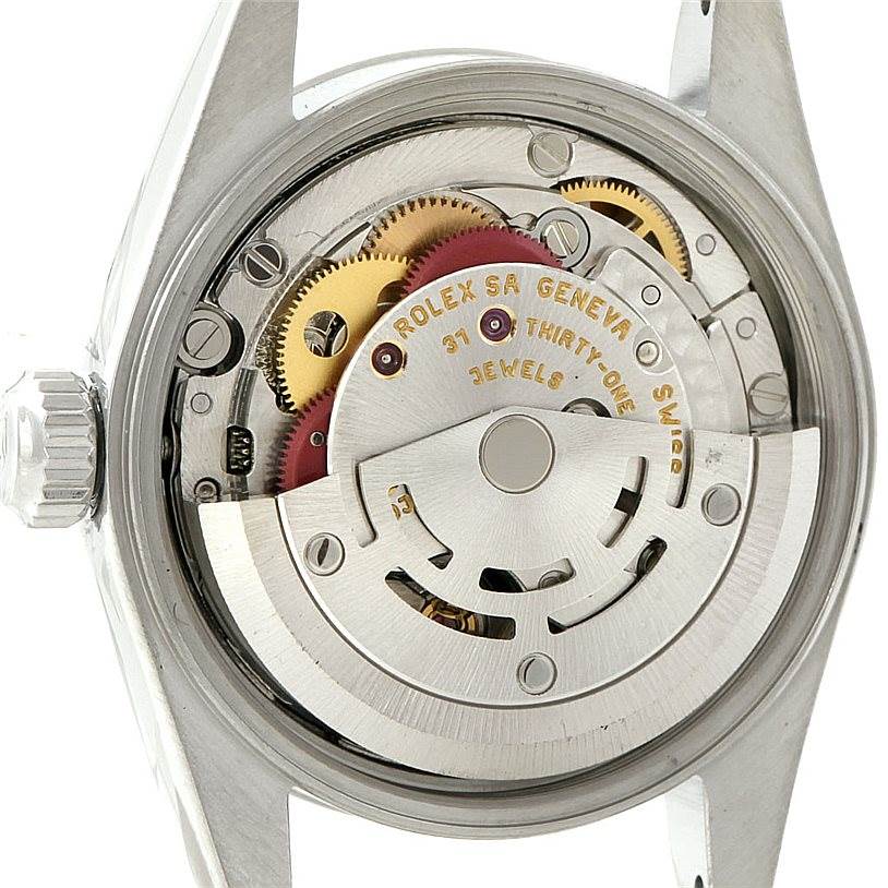 The image shows the backside and internal mechanism of a Rolex Oyster Perpetual 76080 Women's Stainless Steel Blue Dial 76080 Women's Stainless Steel Blue Dial watch.