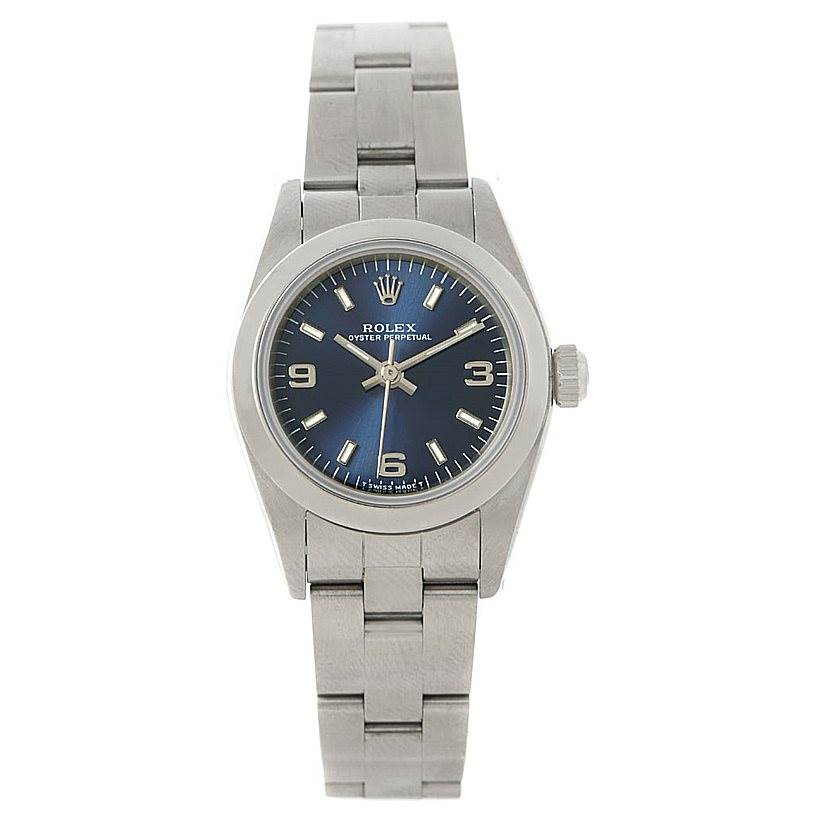The image shows a front view of a Rolex Oyster Perpetual 76080 Women's Stainless Steel Blue Dial 76080 Women's Stainless Steel Blue Dial watch with a blue dial and stainless steel bracelet.