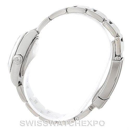 The Rolex Oyster Perpetual 176200 Women's Stainless Steel Black Dial 176200 Women's Stainless Steel Black Dial watch is shown from a side profile angle, focusing on the bracelet and the side of the case.