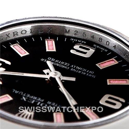 This image shows a close-up angle of the dial and rehaut of a Rolex Oyster Perpetual 176200 Women's Stainless Steel Black Dial 176200 Women's Stainless Steel Black Dial model watch.