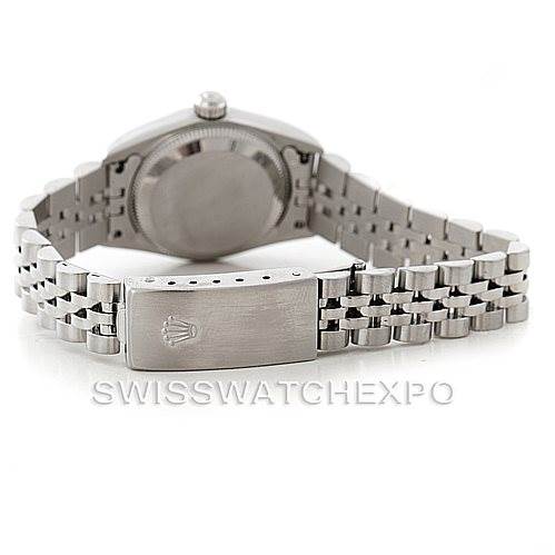 The image shows the back of a Rolex Oyster Perpetual 76030 Women's Stainless Steel Pink Dial 76030 Women's Stainless Steel Pink Dial watch, highlighting the bracelet and clasp with the brand's logo.