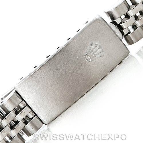 This image shows the clasp and part of the bracelet of a Rolex Oyster Perpetual 76030 Women's Stainless Steel Pink Dial 76030 Women's Stainless Steel Pink Dial watch, featuring the Rolex crown logo.